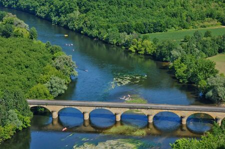 France, the picturesque bridge of Castelnaud in Dordogneの写真素材