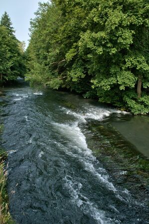 France, Andelle river in the picturesque village of Radepont in Normandie