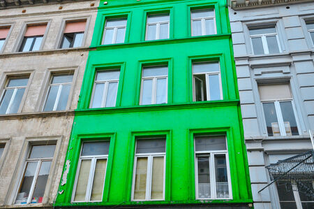 Belgium, a green house in the picturesque city of  Brusselsの写真素材