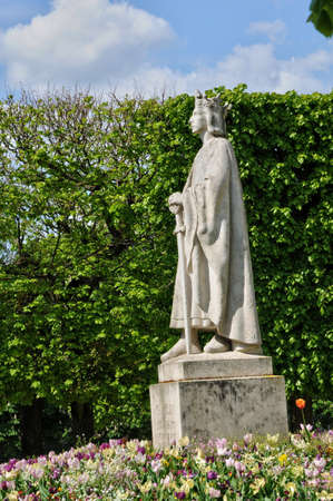 Ile de France, a Saint Louis statue in the city of Poissyの写真素材