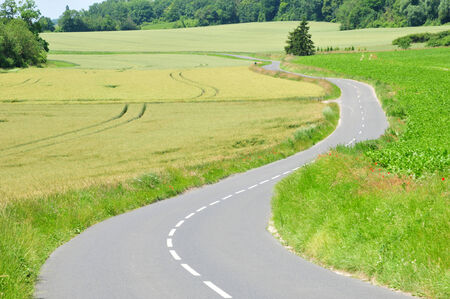 Ile de France, road near the picturesque village of Themericourt 