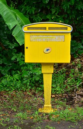 Martinique, a yellow mailbox in the village of Les Les trois Ilets