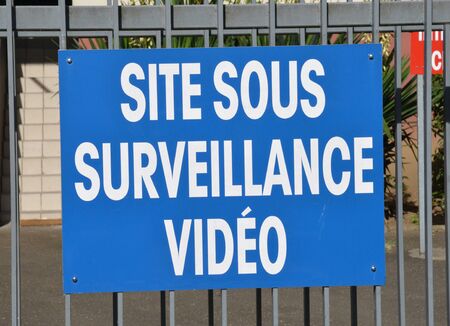 Les Mureaux, France - august june 7 2015 : video surveillance sign on a gateのeditorial素材