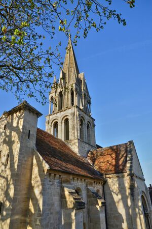 Vernouillet, France - april 12 2015 : the picturesque church in springのeditorial素材
