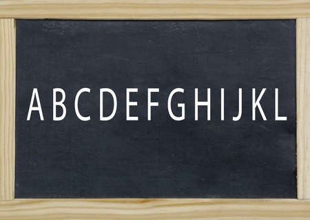 ABCDEFGHIJKLMNOP written on a chalkboard