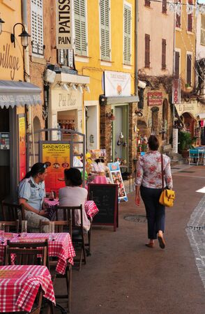 Bormes les Mimosas, France - april 18 2016 : restaurant in the old village in springのeditorial素材