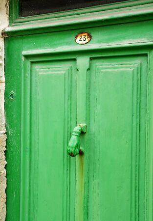 Ars en Re, France - september 26 2016 : close up of an old doorの写真素材