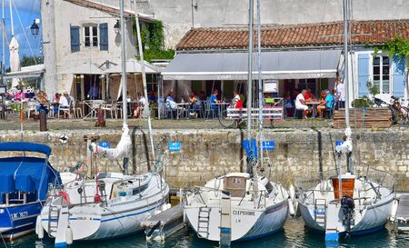 Saint Martin de Re, France - september 25 2016 : the picturesque village and boat in the portのeditorial素材