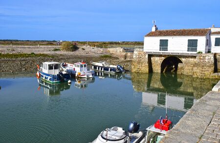 Loix, France - september 26 2016 : the picturesque water mill in autumnのeditorial素材