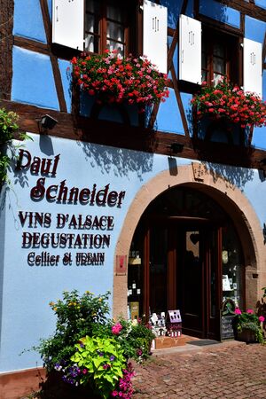 Eguisheim, France - july 23 2016 : wine grower in the historical village in summerのeditorial素材