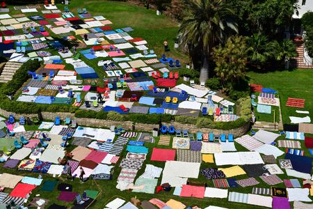Santa Barbara, USA - july 15 2016 : beach towel exhibition near law courtのeditorial素材