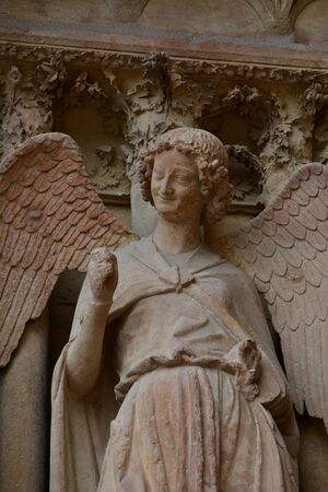 Reims, France - july 25 2016 : the smiling angel of the Notre Dame cathedral where the kings of France were crownedのeditorial素材