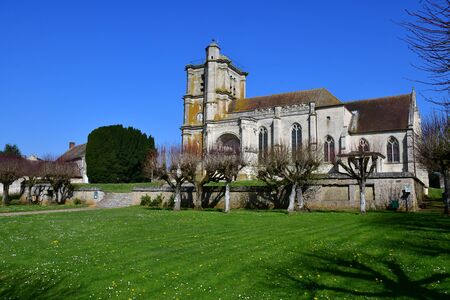 Montjavoult , France - april 3 2017 : the picturesque church in springのeditorial素材