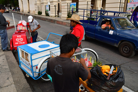 San Cristobal De Las Casas;  Chiapas, United Mexican States - may 16 2018 : food seller in the picturesque old cityのeditorial素材