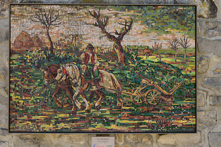 Barbizon, France - july 21 2017 : copy of famous painting on wall on a street wallのeditorial素材