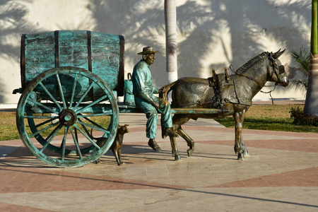 San Francisco de Campeche; United Mexican States - may 18 2018 : bronze statue inthe picturesque old cityのeditorial素材