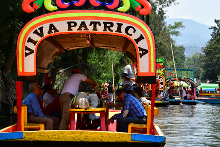 Mexico;  United Mexican State - may 13 2018 : touristy and restaurant boat on the canal in Xochimilco boroughのeditorial素材