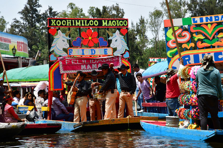 Mexico;  United Mexican State - may 13 2018 : touristy and restaurant boat on the canal in Xochimilco boroughのeditorial素材