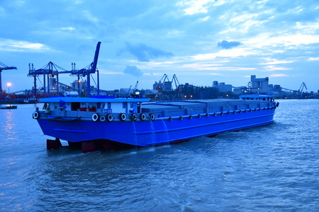 Ho Chi Minh City, Saigon, Socialist Republic of Vietnam - august 16 2018 : barge on the Saigon riverのeditorial素材