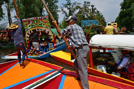 Mexico;  United Mexican State - may 13 2018 : touristy and restaurant boat on the canal in Xochimilco boroughのeditorial素材