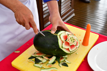 Kingdom of Cambodia - august 19 2018 : sculpture on a watermelonのeditorial素材