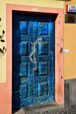 Funchal, Portugal - february 21 2018 : painted door in santa Maria streetのeditorial素材