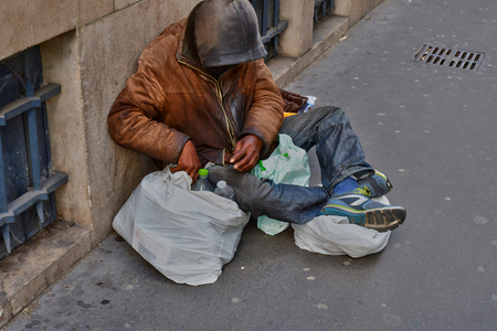 Paris; France - april 2 2017 : an homeless man near Alma bridgeのeditorial素材