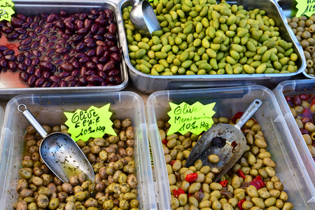 Verneuil sur Seine; France - october 2018 : stall of olives at the marketのeditorial素材