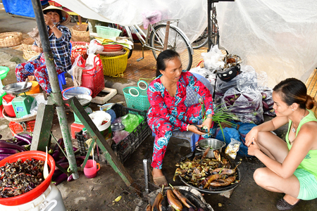 Sa Dec; Socialist Republic of Vietnam - august 18 2018 : seafood at the picturesque daily marketのeditorial素材