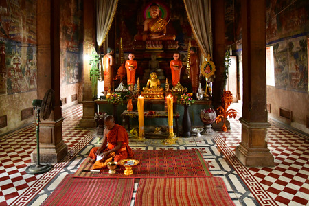 Kampong Tralach; Kingdom of Cambodia - august 21 2018 : a bhikkhu in the Wat Kampong Tralach Leu...