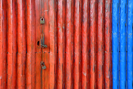 Siem Reap; Kingdom of Cambodia - august 25 2018 : red door with padlockのeditorial素材