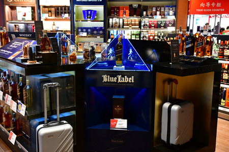 Siem Reap; Kingdom of Cambodia - august 25 2018 : alcohol in a duty free in the airportのeditorial素材