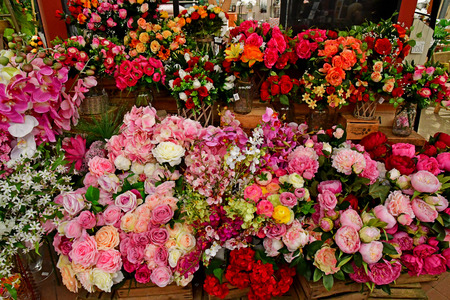 Saint Cyr l Ecole; France - june 16 2019 : artificial flowers in a  garden centerのeditorial素材