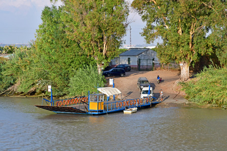 Sevilla; Spain - august 27 2019 : ferry on the Guadalquivir river near sevillaのeditorial素材