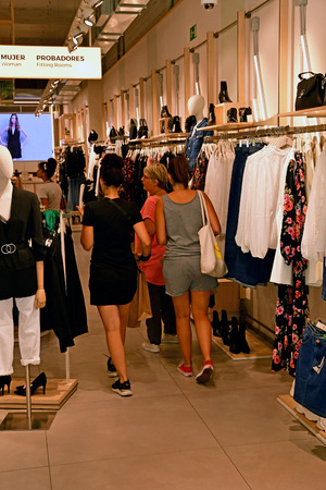 Granada; Spain - august 27 2019 : cloth shop in the modern part of the cityのeditorial素材
