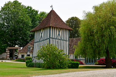 Harquency; France - july 19 2019 : dovecote of the la Grange de Bourgoult, an old commandery of Templars built in the 13th centuryのeditorial素材