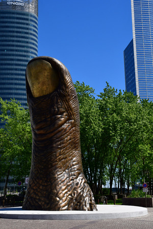 Paris La Defense; France - may 25 2017 : The Thumb by Cesar in La Defense district, the biggest business distric in Europeのeditorial素材