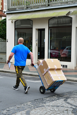 Deauville, France - september 27 2019 : parcel deliveryのeditorial素材