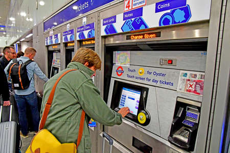 London, England - may 1 2019 : oyster card distributor in the Saint Pancras station