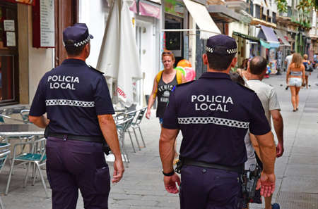 Cadiz; Spain - august 28 2019 : the municipal police in the historical city centreのeditorial素材