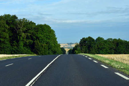 La Chapelle en Vexin, France - august 8 2019 : the D 6014 road between Magny en Vexin and Fleury sur Andelleのeditorial素材