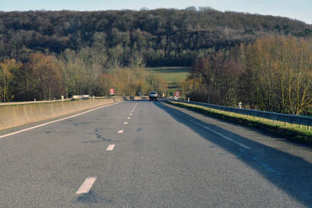 Authevernes, France - january 29 2020 : the D 6014 road between Magny en Vexin and Fleury sur Andelleのeditorial素材