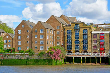 London; England - May 5 2019: Thames river cruise in Docklandsのeditorial素材