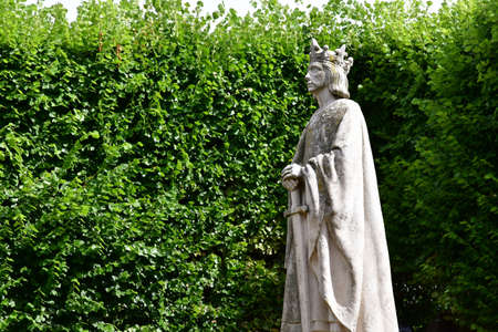 Poissy, France - july 19 2020: the statue of Saint Louis near the collegiate churchのeditorial素材