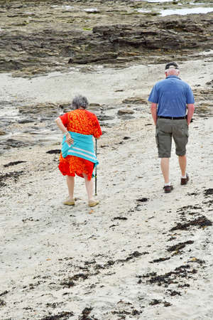 Le Tour du Parc, France - june 6 2021: an old couple on the Rouvran beachのeditorial素材