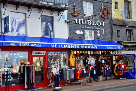 Honfleur; France - September 27 2019: a cloth shop in the city centerのeditorial素材