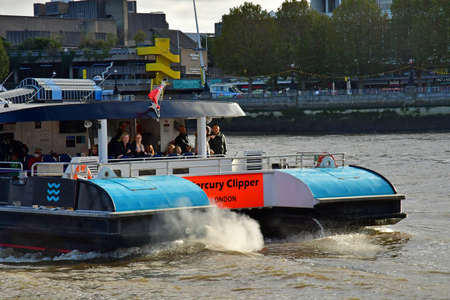 London; England - October 21 2021: a fluvial cruise on the Thames riverのeditorial素材