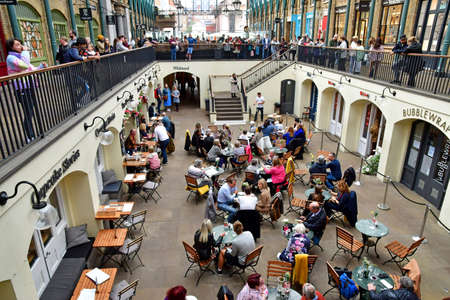 London; England - October 21 2021: restaurant in the old market in the Covent Garden districtのeditorial素材