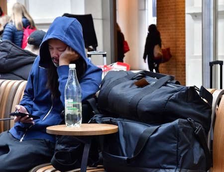 London; England - October 21 2021: a traveler in King Cross stationのeditorial素材
