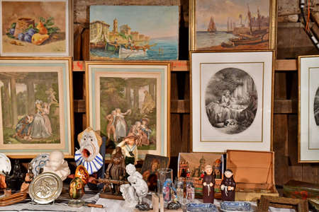 Dives sur Mer; France - November 27 2021: a flea market in the old covered marketのeditorial素材